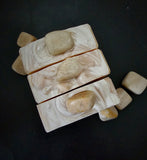 Peach colors soap with a genuine peach moonstone set on the top