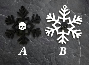 assorted black and white snowflake ornaments with skulls