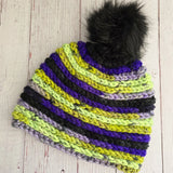 Pom Pom Beanie Hats in Purple, gree, black and gray stripes with a black pom