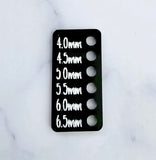 Hook reminders in 4.0 - 6.5 mm in black with white lettering